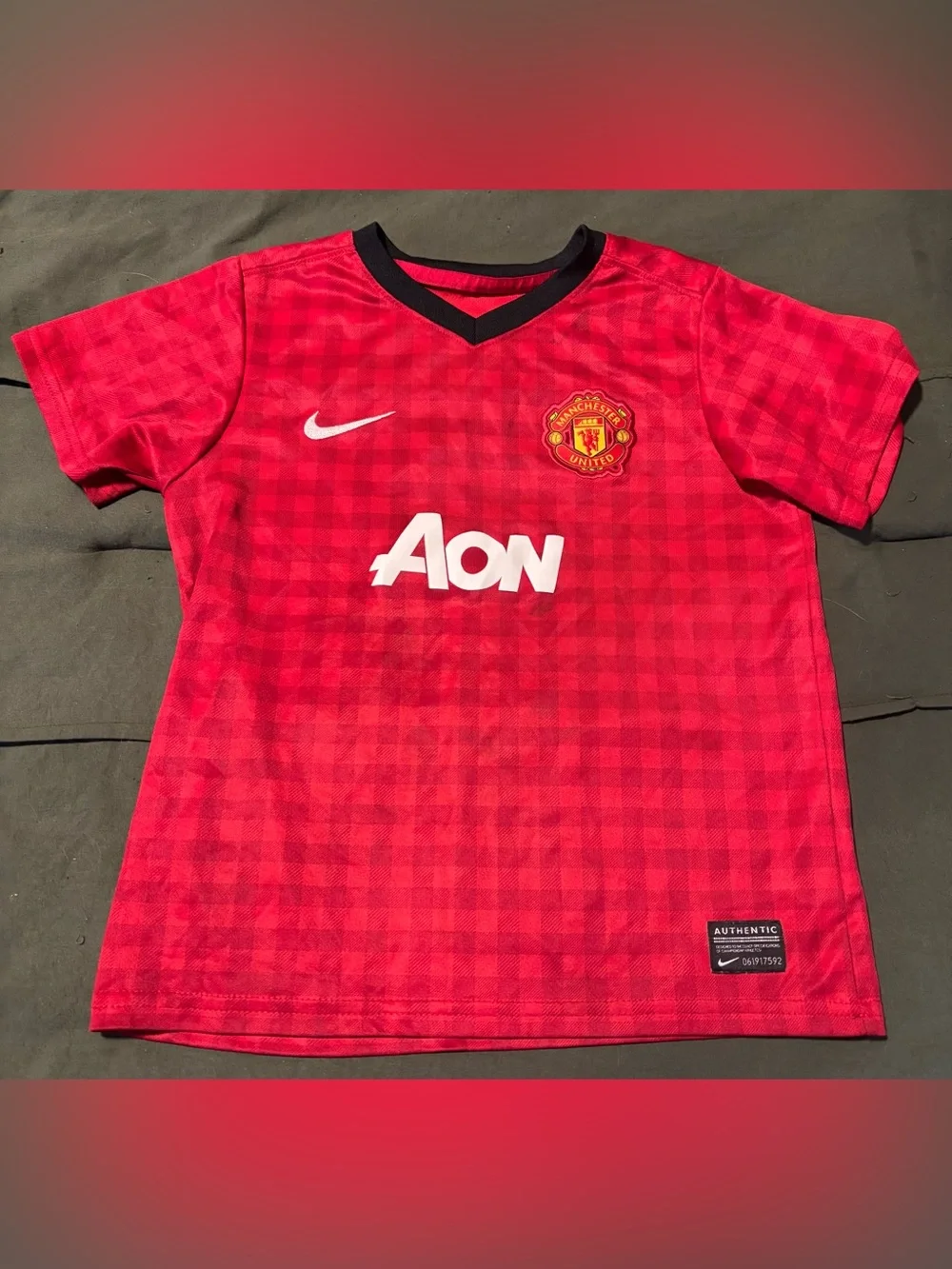 Nike Kids Red Manchester United Jersey with Black Trim